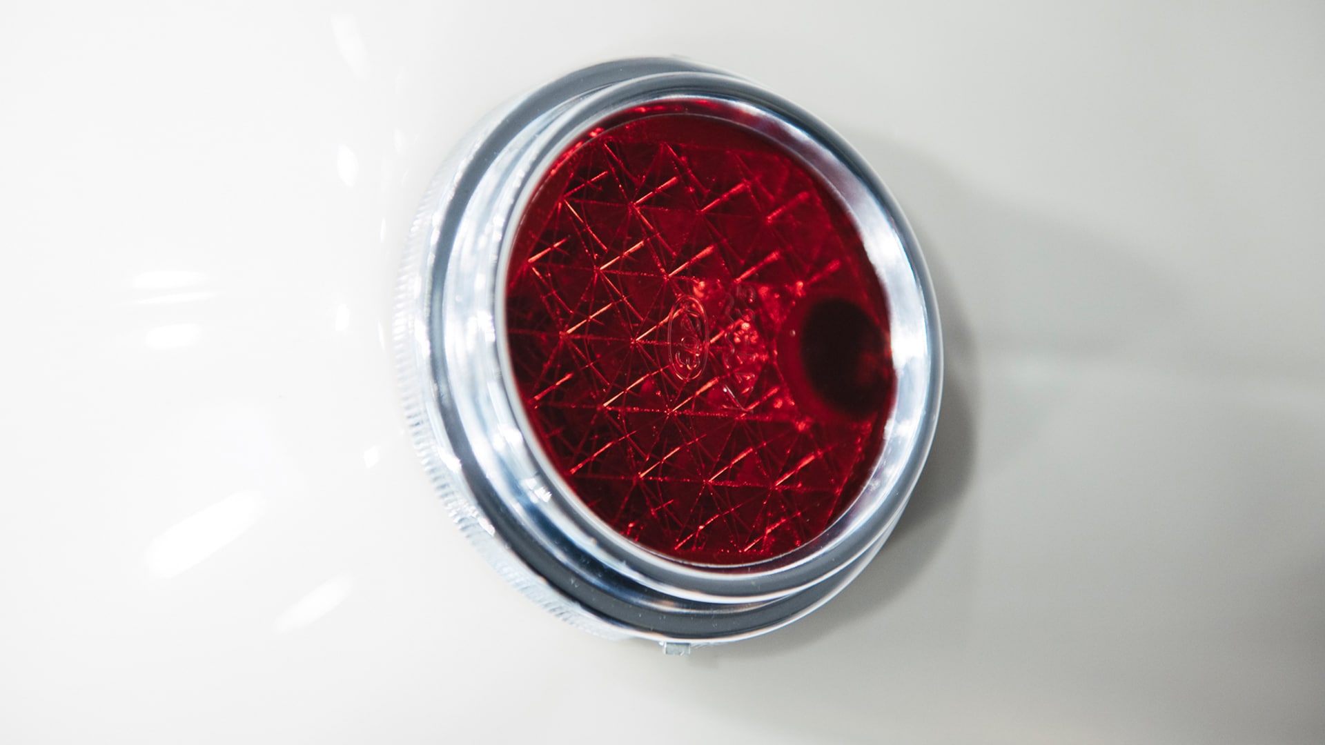 The tail light of a BMW Isetta